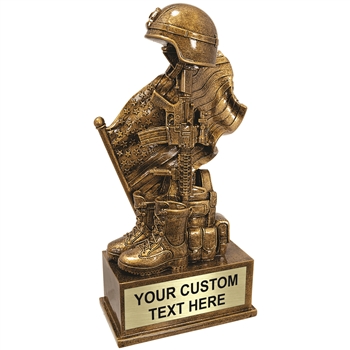 Antique gold military resin trophy featuring helmet, rifle, and boot with engraved award plate